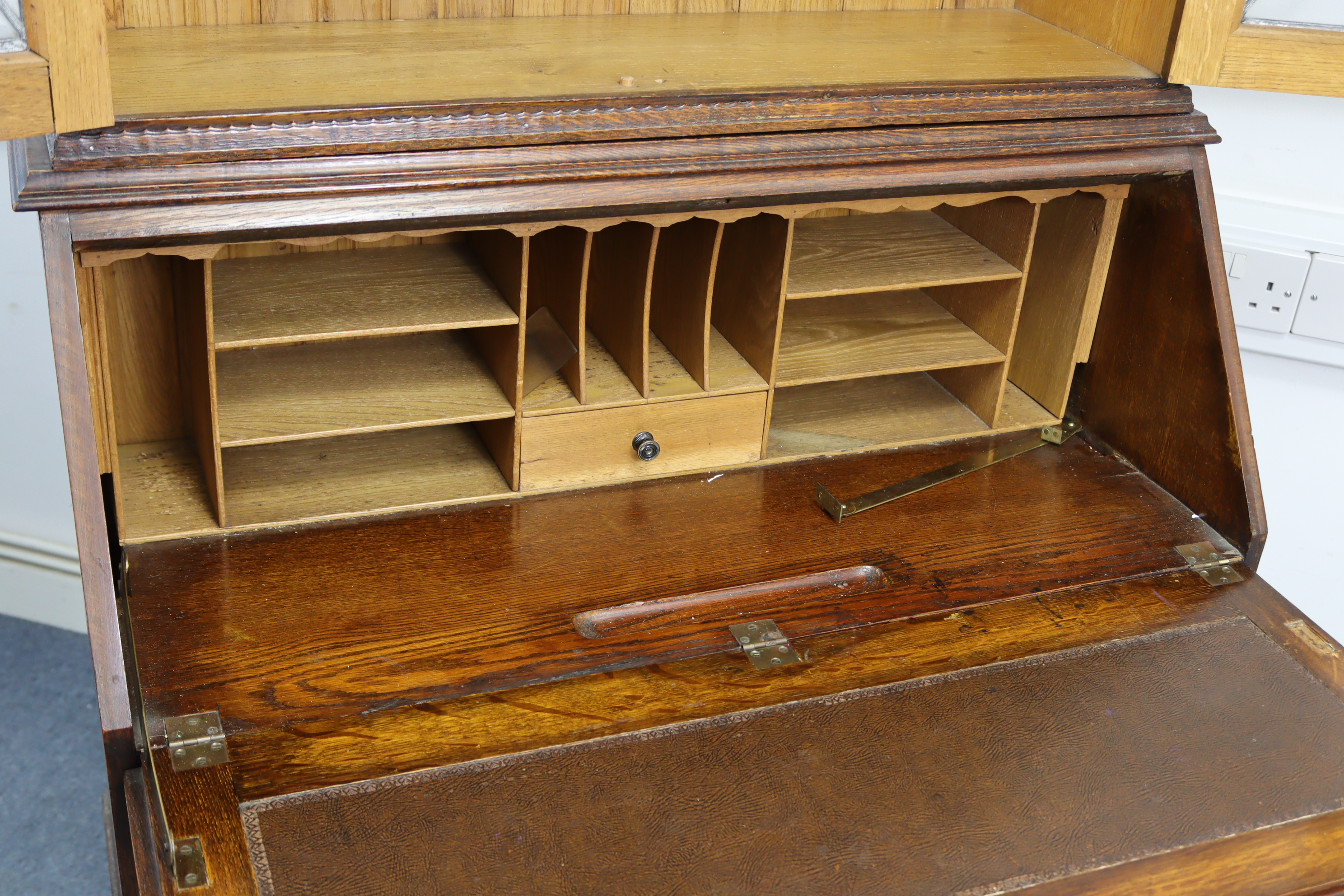 A 1930’s oak bureau-bookcase, the upper part with two adjustable shelves enclosed by pair of - Image 4 of 4