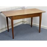 A Carson’s teak office table with rectangular top, fitted frieze drawer, & on four square tapered