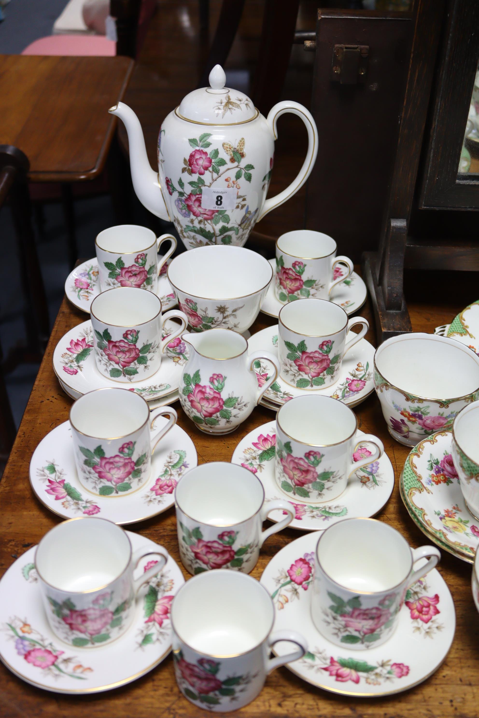 A Wedgwood bone china “Charnwood” pattern twenty-three piece coffee service (settings for ten); & an