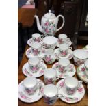 A Wedgwood bone china “Charnwood” pattern twenty-three piece coffee service (settings for ten); & an