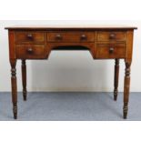A 19th century inlaid-mahogany kneehole dressing table fitted with an arrangement of five drawers, &