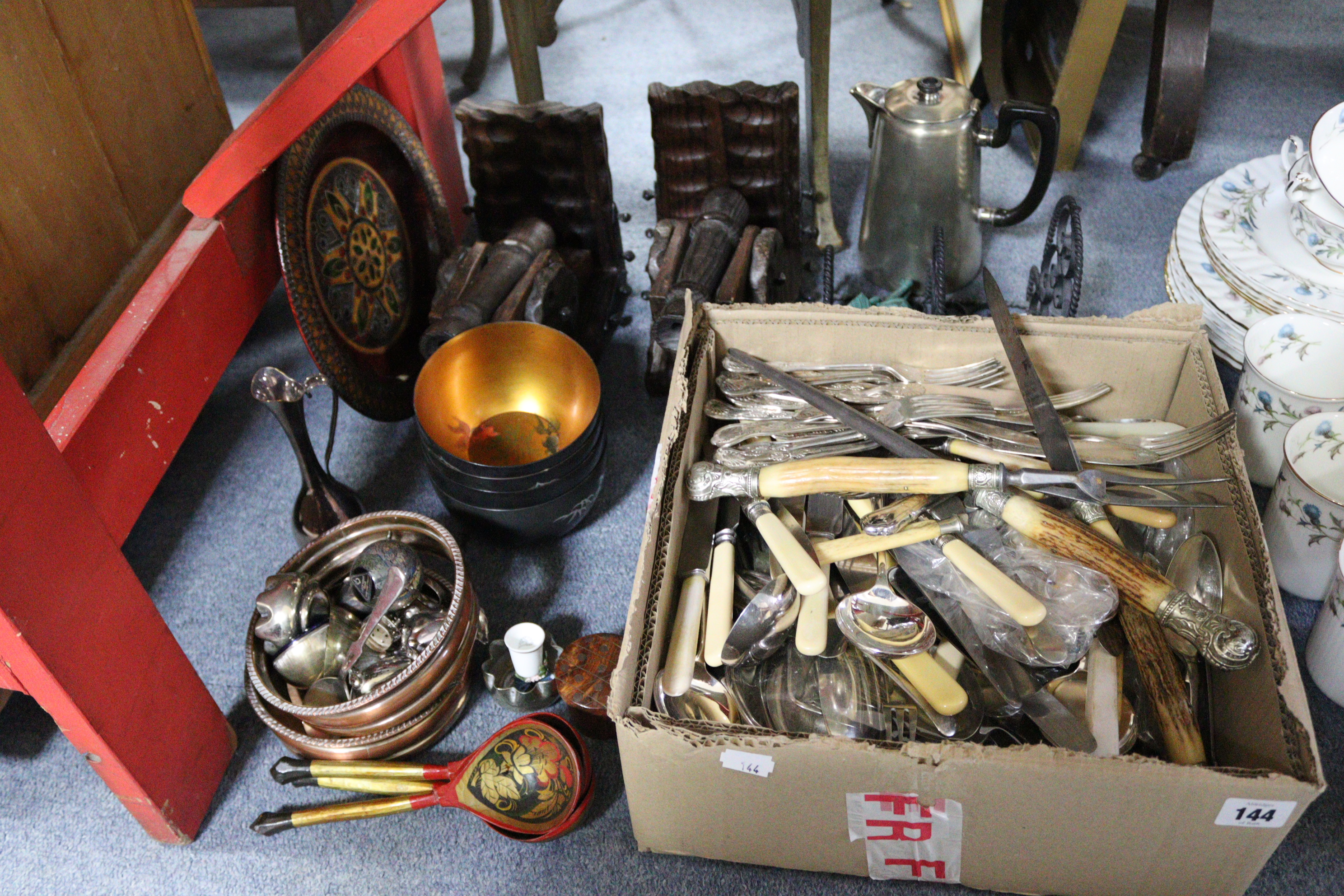 A set of three carvers with antler handles; together with various items of silver plated