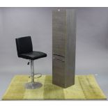 A grey laminate tall upright cupboard, enclosed by two panel doors, 13¾” wide x 59” high; together