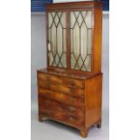 A GEORGE III FIGURED MAHOGANY SECRETAIRE BOOKCASE, with moulded cornice above three adjustable