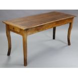 An early 19th century French fruitwood farmhouse table, the rectangular overhang top with cleated