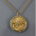 An Elizabeth II sovereign, 1974, loose-mounted as a pendant within a 9ct. gold rope-twist border, on