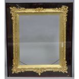 A Victorian gilt gesso picture frame with oak-leaf & acorn corners, internal size: 15” x 12”, in