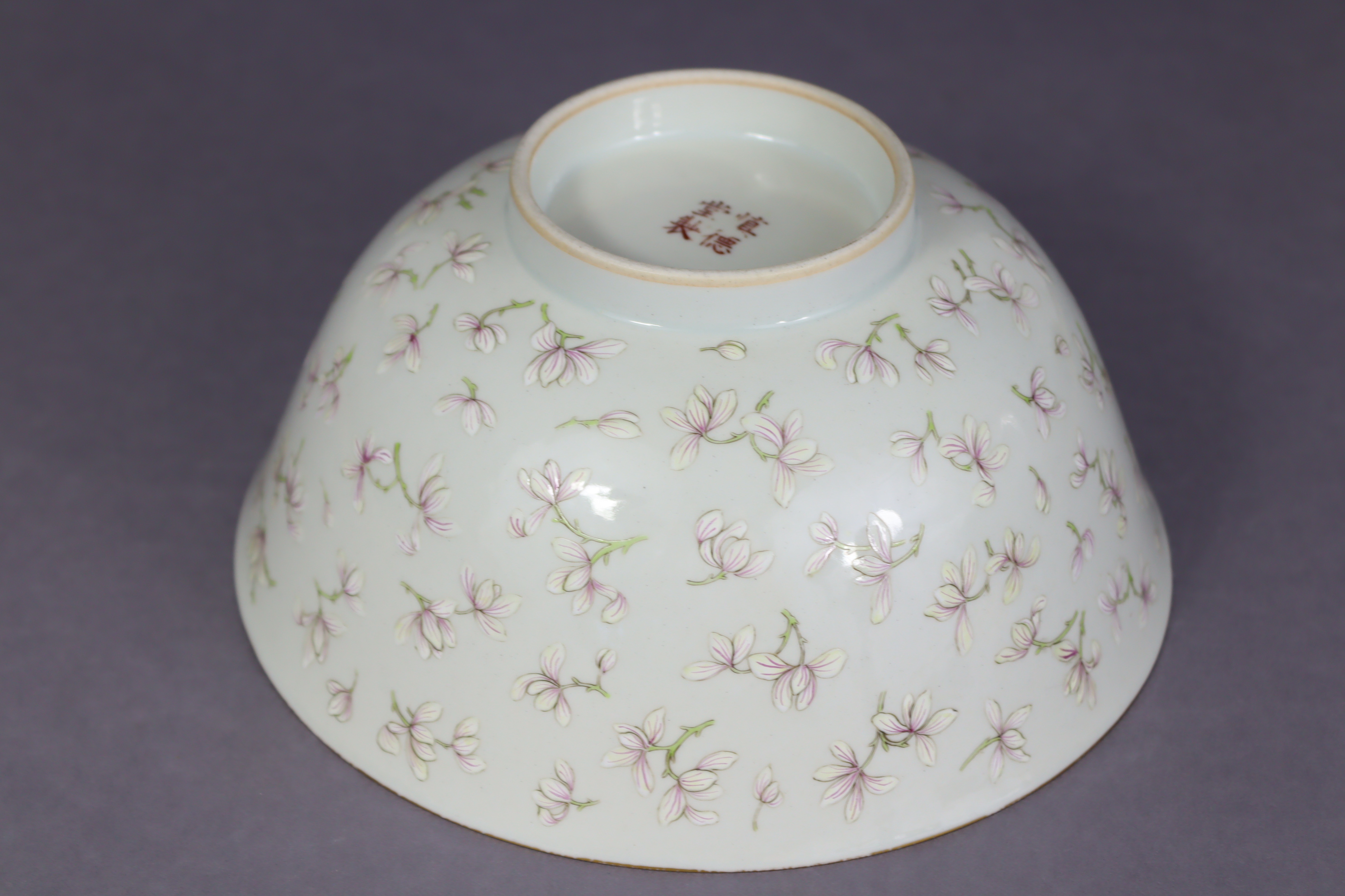 A Chinese porcelain bowl of off-white ground, the exterior with all-over decoration of blossoming - Image 6 of 6