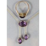 A 9ct. gold ring set rectangular amethyst measuring approx. 11mm x 8mm x 5mm (size: M; 2.7gm); & a