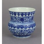 A Chinese blue & white porcelain “Sha Dou” vase, decorated all-over with scrolling flowers between