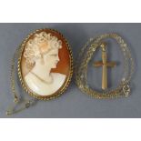 A carved shell oval cameo brooch depicting a female bust, in yellow metal mount stamped “9ct”, 1¾” x