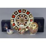 A Royal Crown Derby owl paperweight, 4¼” high; a Goldcrest ditto, 3¼” long (both boxed); a Royal