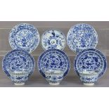 A set of three Chinese Kangxi period blue & white porcelain fluted teabowls & saucers painted with