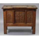 A CRAFTSMAN-MADE SOLID JOINED OAK DWARF CABINET, the top with two sliding hinged lids above a