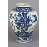 A 19th century Persian faience baluster vase, with slightly flared short neck & lobed body,