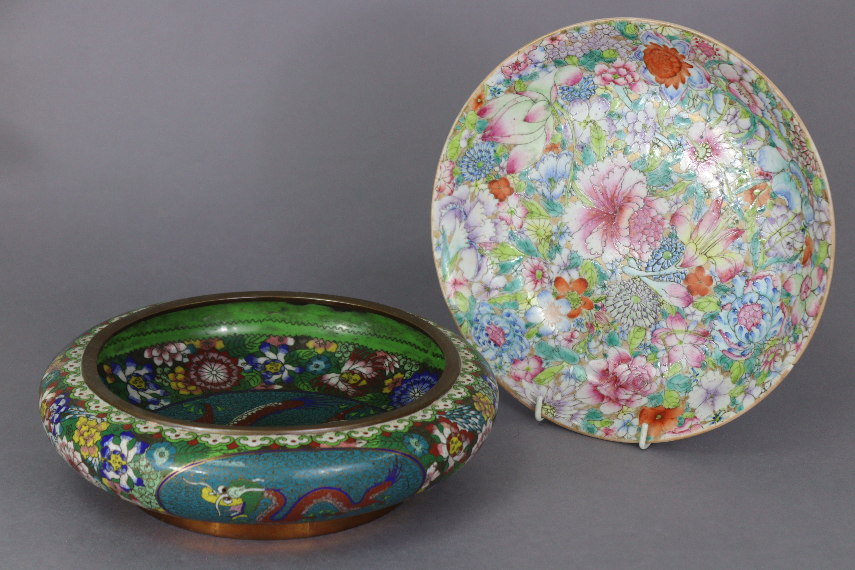 A Chinese porcelain shallow dish with all-over millefleur decoration in famille rose enamels, Qianlo