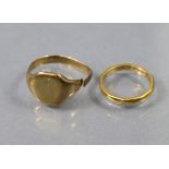 A 22ct gold wedding band, London 1955 (size I; 2.4gm); & a gold signet ring (shank broken; 3.5gm).
