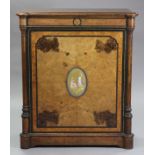 A mid-19th century French burr-walnut ebonised & amboyna gilt-metal mounted side cabinet, the