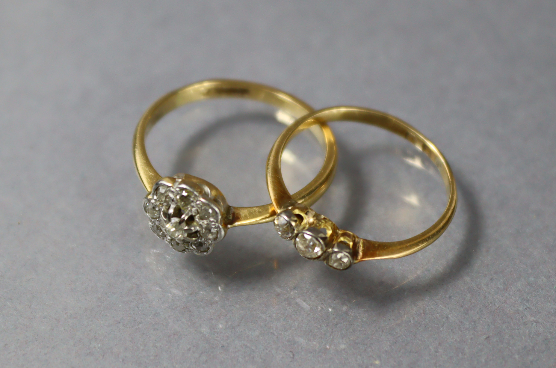A gold & platinum ring set cluster of small diamonds (Size: L; weight: 2.3gm); & another ring set - Image 2 of 3