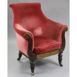 A GEORGE IV SIMULATED ROSEWOOD & BRASS-INLAID ARMCHAIR, upholstered rose-pink velour, with