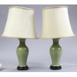 A pair of Chinese porcelain celadon glazed baluster vases forming table lamps, each with shade &