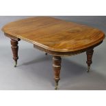 A mid-Victorian extending dining table with D-shaped ends & moulded edge, wind-out mechanism & one