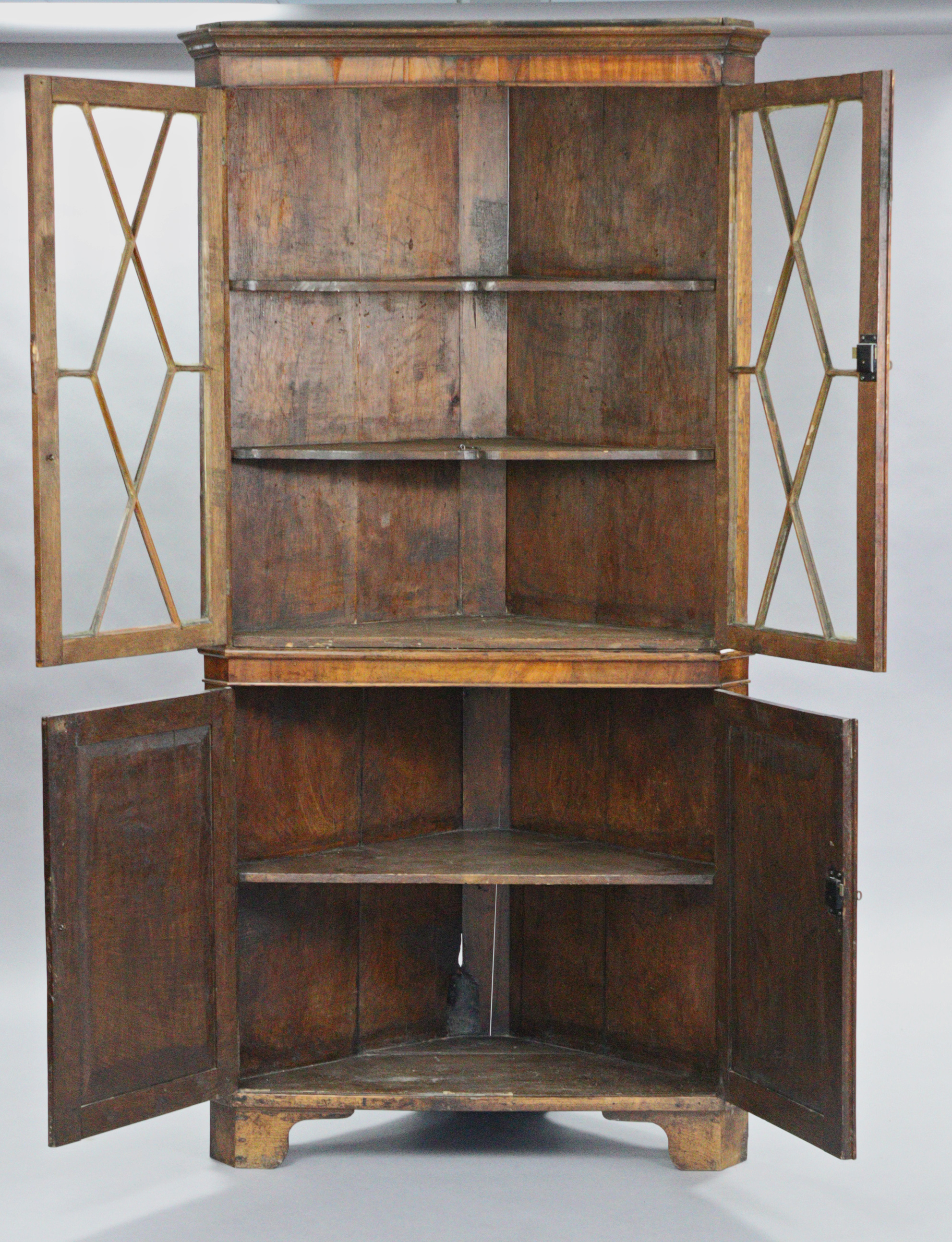 A late 18th century oak standing corner cabinet, the upper part fitted two shelves enclosed by - Image 2 of 2