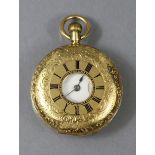 A late 19th/early 20th century 18K continental small pocket watch in half-hunter style case with