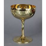 A 9ct. gold champagne goblet, the bowl with engraved navette motifs, on slender hexagonal stem &