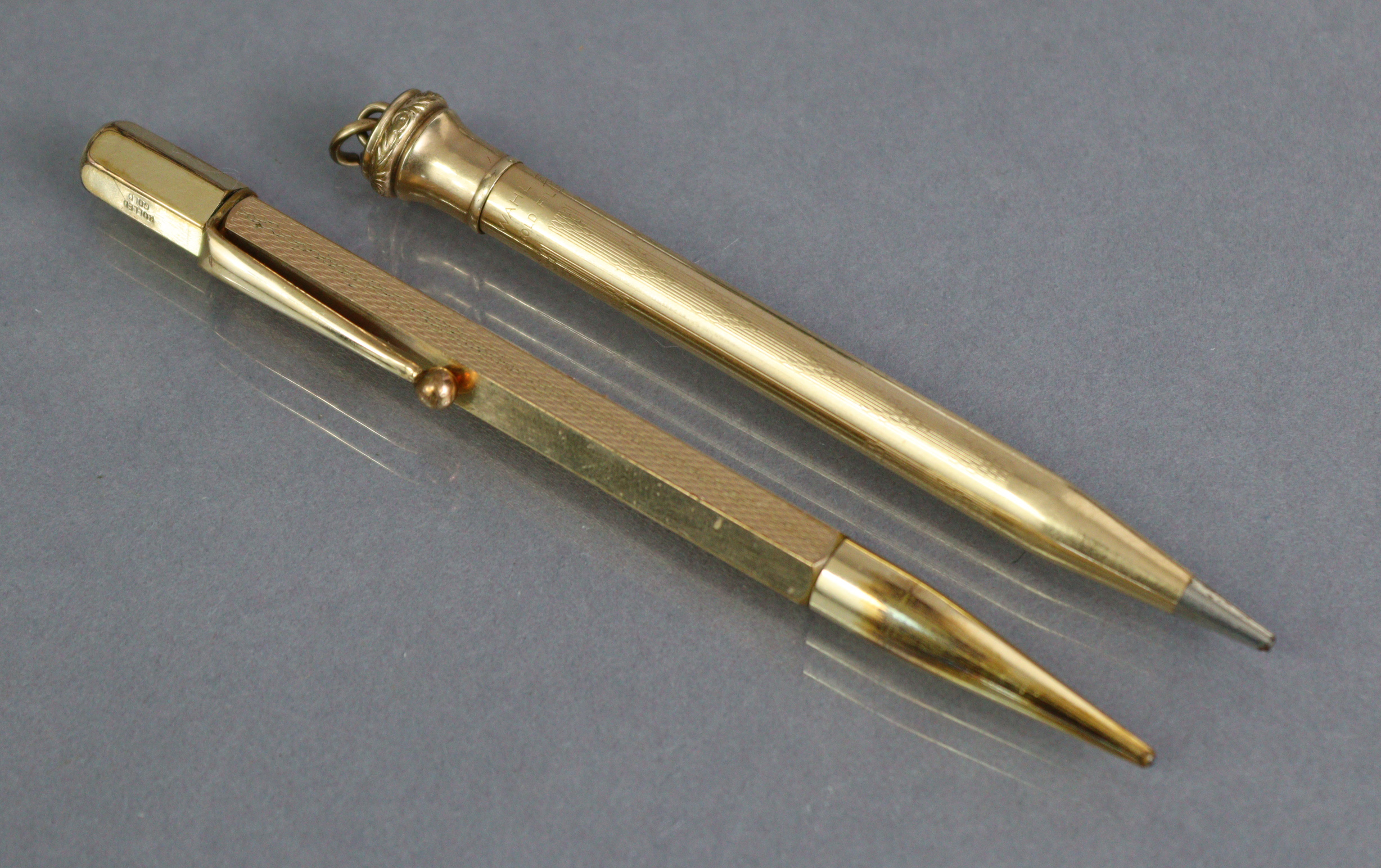 A Wahl “Eversharp” propelling pencil in “gold-filled” case; & a similar propelling pencil in “rolled