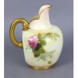 A Royal Worcester porcelain ewer of rounded form with upright spout, the body painted with roses