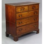 A George III mahogany chest, with moulded edge to the rectangular top, fitted two short & three long