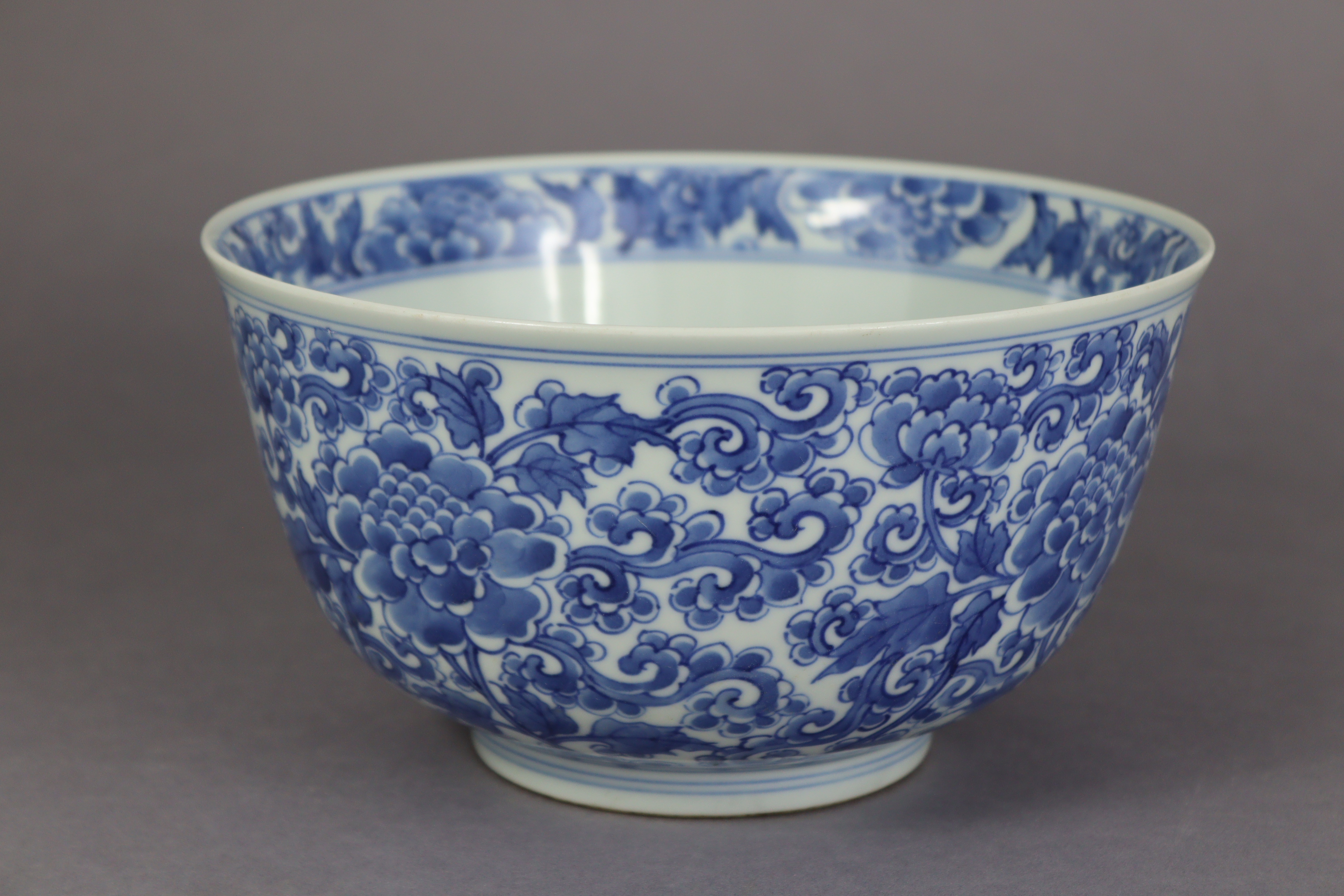 A Chinse blue & white porcelain deep bowl, decorated to the interior & exterior with scrolling - Image 2 of 8