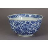 A Chinse blue & white porcelain deep bowl, decorated to the interior & exterior with scrolling