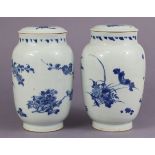 A pair of 18th century Chinese blue & white porcelain jars covers of slender ovoid shape, each with