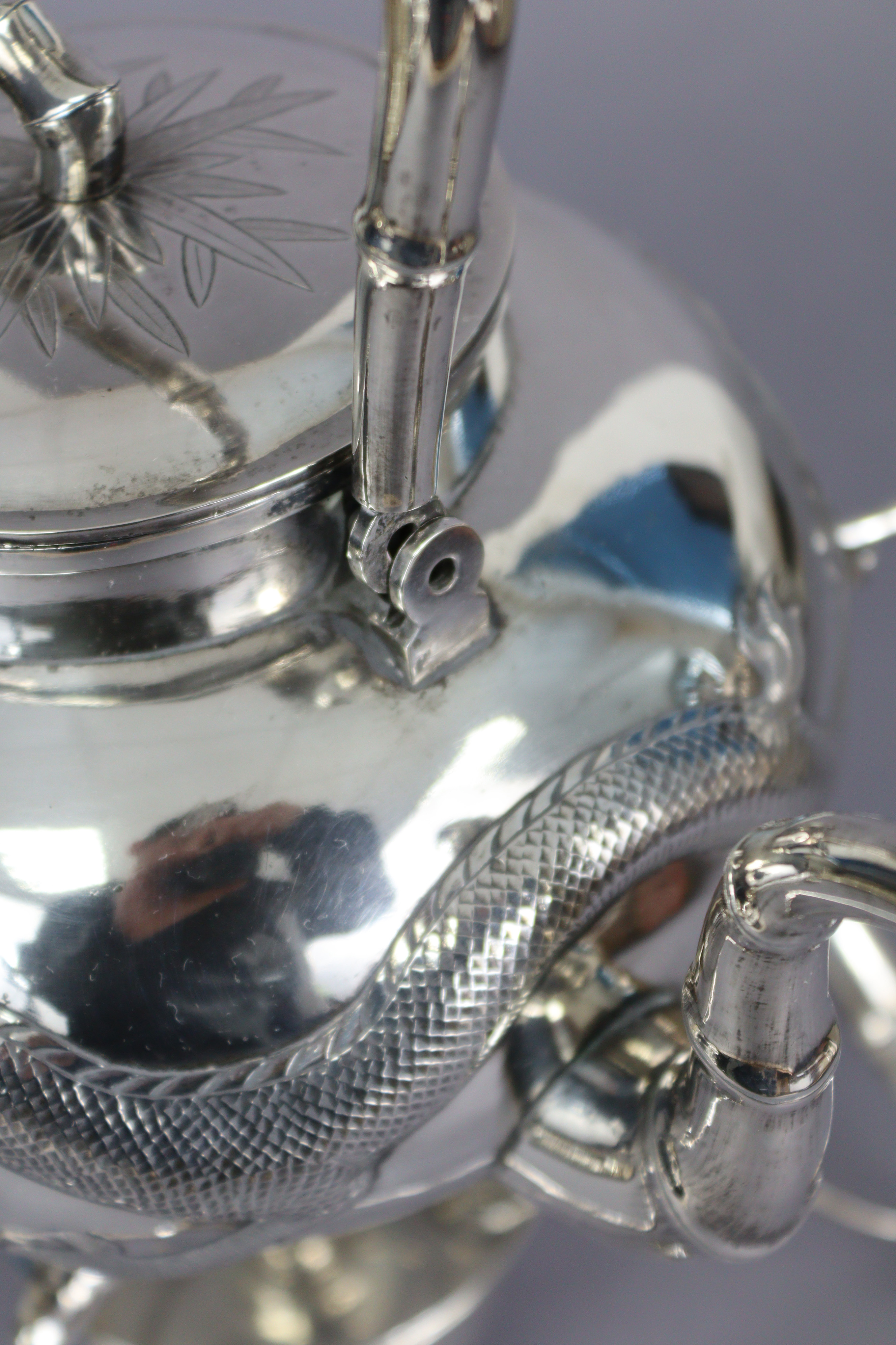 A CHINESE SILVER TEA KETTLE by KWONG MAN SHING, of compressed round form, embossed with an - Image 7 of 7