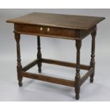 An early 18th century joined oak side table with moulded edge to thee rectangular overhang top,