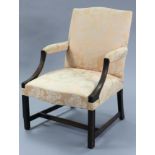 A Georgian-style mahogany armchair with padded seat, back & arms, upholstered salmon pink silk