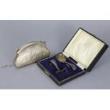 A George V silver ladies’ evening purse with chain handle & leather interior, Birmingham 1916; & a