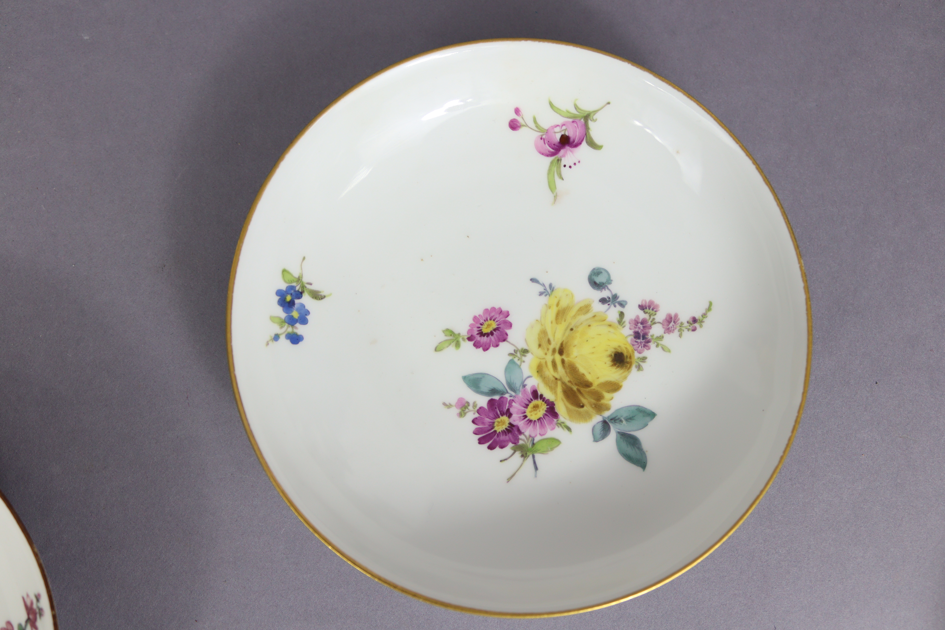 An 18th century Meissen porcelain saucer painted with flower-sprays & with brown rim, 5¼” diam.; a - Image 5 of 9
