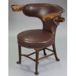 A mid-18th century cock-fighting chair, with curved back & circular padded seat upholstered later