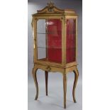 A Louis XV style kingwood veneered & gilt-metal mounted vitrine, with foliate scroll surmount