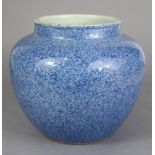 A Chinese porcelain powder-blue glazed vase, of squat round shape, with un-glazed base, 7½” high x