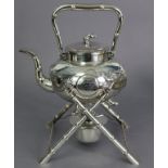 A CHINESE SILVER TEA KETTLE by KWONG MAN SHING, of compressed round form, embossed with an