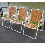 A set of four white-metal & wooden slatted fold-away garden chairs.