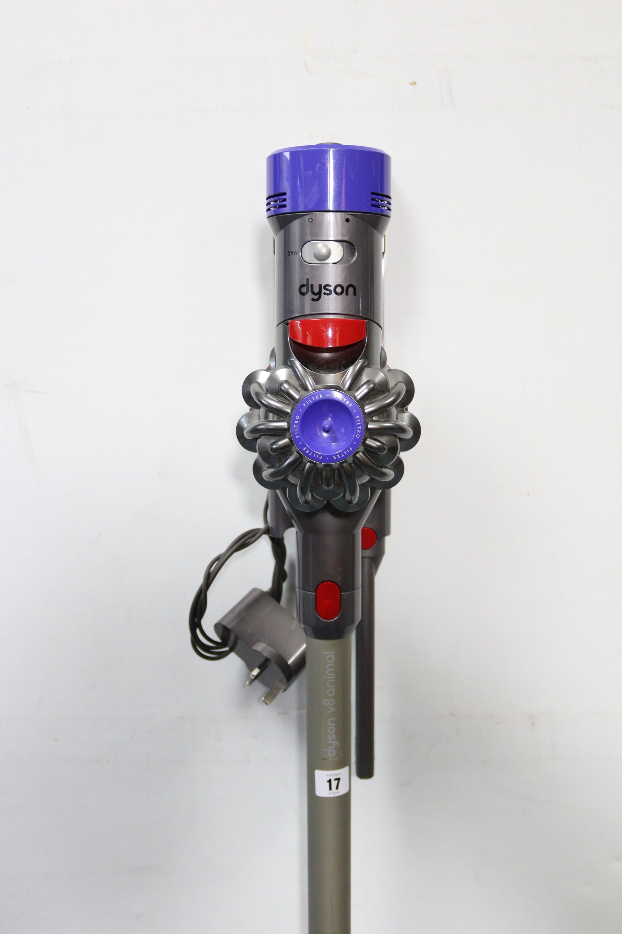 A Dyson “V8 Animal” cordless vacuum cleaner, with charger, w.o.