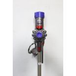 A Dyson “V8 Animal” cordless vacuum cleaner, with charger, w.o.