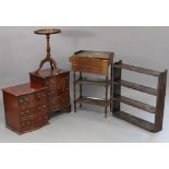 A mahogany three-tier tea trolley, 20” wide; together with a pair of three-drawer bedside chests;