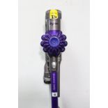 A Dyson “V6 Animal” cordless vacuum cleaner with charger, w.o.