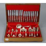 A canteen of silver plated & stainless-steel cutlery comprising ninety items & in walnut case.